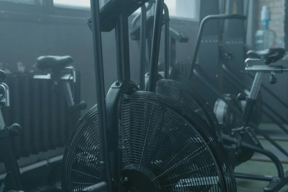 Home spinning room with air bikes and fan wheels