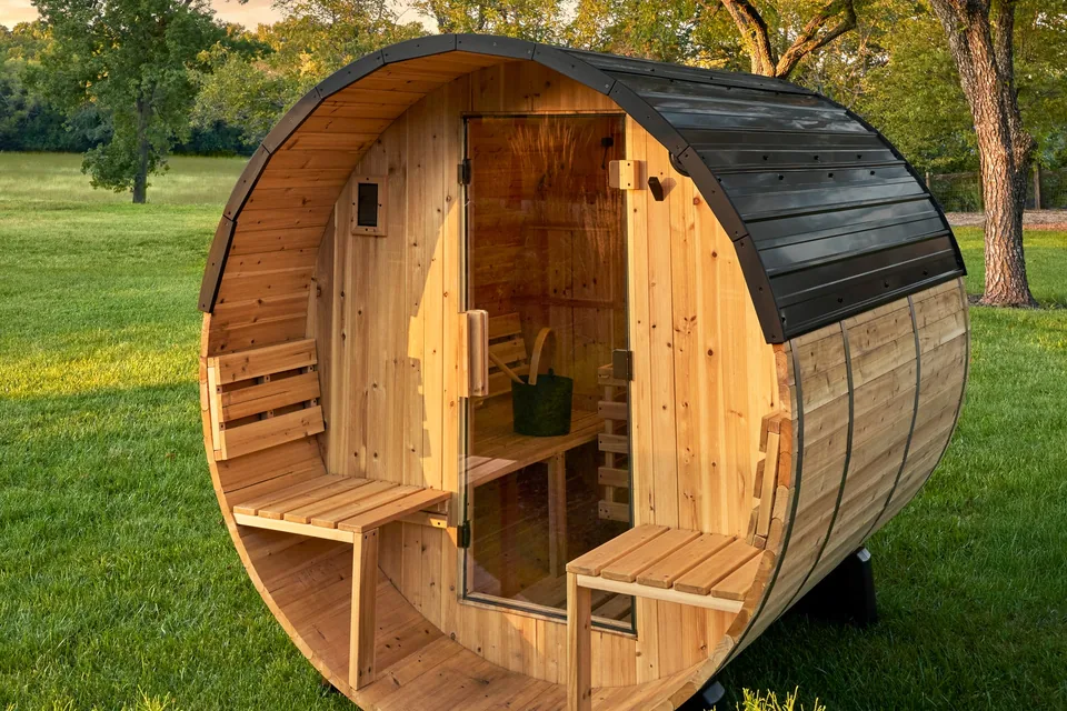Outdoor barrel sauna in backyard