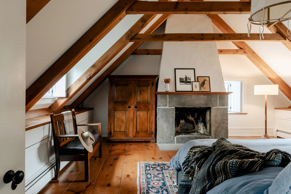 Finished attic converted into a bright living space with sloped ceilings
